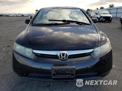 Piąte zdjęcie samochodu w środku: 2006 HONDA CIVIC LX VIN:1HGFA16576L037751 - miniatura