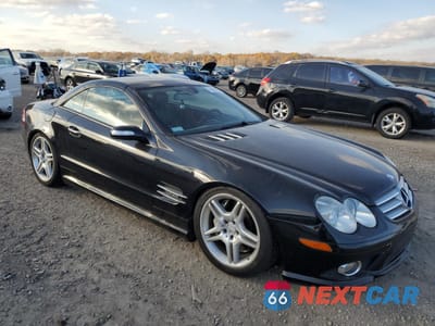 Czwarte zdjęcie samochodu z boku: 2007 MERCEDES-BENZ SL 600 VIN:WDBSK77F27F132303 - miniatura