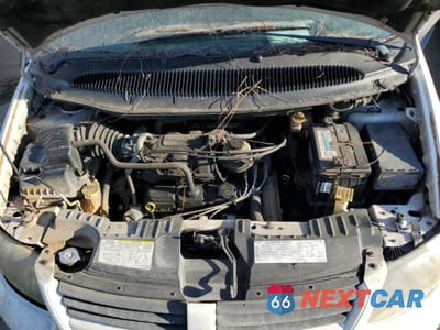 Zdjęcie 12 z 13 samochodu: 2005 DODGE GRAND CARAVAN SE VIN:2D4GP24R25R275402 - miniatura