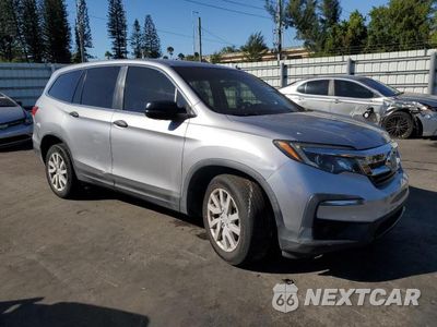 Czwarte zdjęcie samochodu z boku: 2019 HONDA PILOT LX VIN:5FNYF5H16KB033410 - miniatura