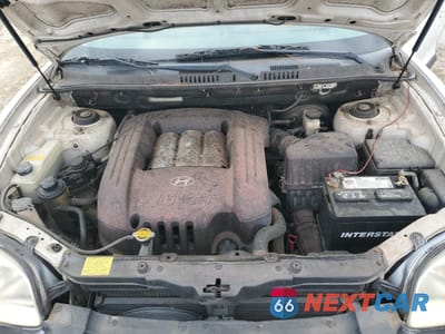 Zdjęcie 12 z 14 samochodu: 2003 HYUNDAI SANTA FE GLS VIN:KM8SC13DX3U565255 - miniatura