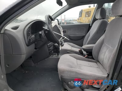 Zdjęcie 7 z 14 samochodu: 2002 KIA SPECTRA BASE VIN:KNAFB121225171948 - miniatura