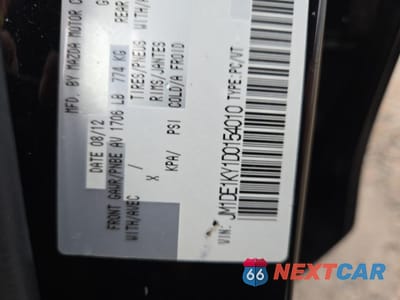 Zdjęcie 12 z 12 samochodu: 2013 MAZDA MAZDA2 VIN:JM1DE1KY1D0154010 - miniatura