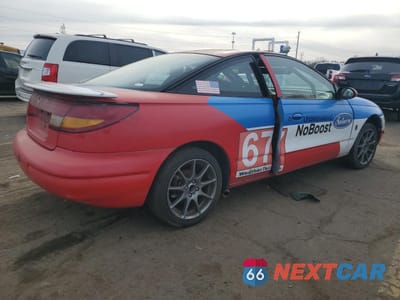 Trzecie zdjęcie samochodu z tyłu: 1999 SATURN SC2 VIN:1G8ZR1270XZ271458 - miniatura