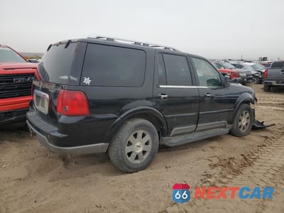 Trzecie zdjęcie samochodu z tyłu: 2003 LINCOLN NAVIGATOR VIN:5LMFU28RX3LJ32286 - miniatura