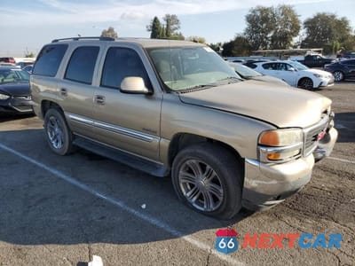 Czwarte zdjęcie samochodu z boku: 2005 GMC YUKON VIN:1GKEC13V85R257912 - miniatura