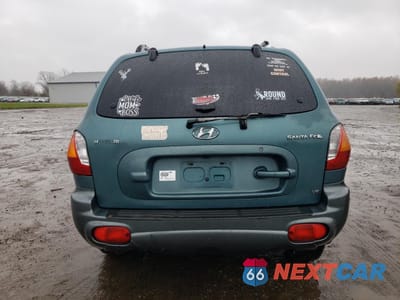 Zdjęcie 6 z 15 samochodu: 2001 HYUNDAI SANTA FE GLS VIN:KM8SC83D11U103866 - miniatura