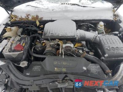Zdjęcie 12 z 14 samochodu: 2004 JEEP GRAND CHEROKEE LAREDO VIN:1J8GW48N14C405866 - miniatura