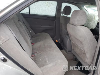 Zdjęcie 10 z 13 samochodu: 2004 TOYOTA CAMRY LE VIN:4T1BE30K24U912555 - miniatura