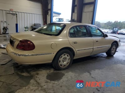 Trzecie zdjęcie samochodu z tyłu: 2002 LINCOLN CONTINENTAL VIN:1LNHM97V72Y659531 - miniatura