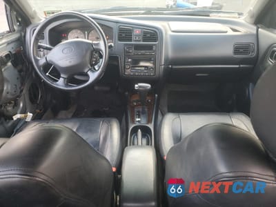Zdjęcie 8 z 13 samochodu: 2001 INFINITI G20 VIN:JNKCP11A51T400740 - miniatura
