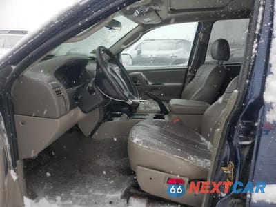 Zdjęcie 7 z 14 samochodu: 2004 JEEP GRAND CHEROKEE LAREDO VIN:1J8GW48N14C405866 - miniatura