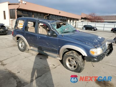 Czwarte zdjęcie samochodu z boku: 1999 FORD EXPLORER VIN:1FMZU35P0XZB77099 - miniatura