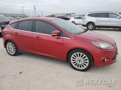 Czwarte zdjęcie samochodu z boku: 2012 FORD FOCUS TITANIUM VIN:1FAHP3N20CL416150 - miniatura