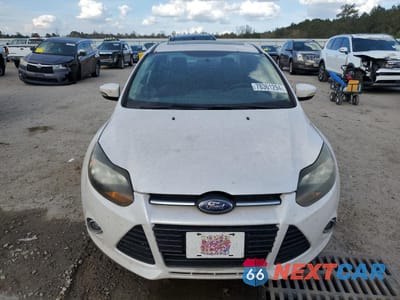Piąte zdjęcie samochodu w środku: 2013 FORD FOCUS TITANIUM VIN:1FADP3J25DL259382 - miniatura