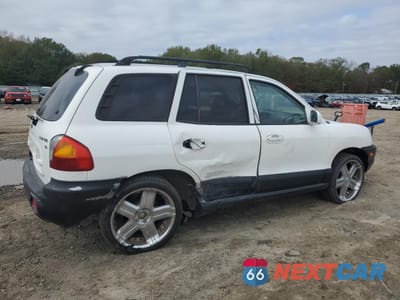 Trzecie zdjęcie samochodu z tyłu: 2003 HYUNDAI SANTA FE GLS VIN:KM8SC13DX3U565255 - miniatura