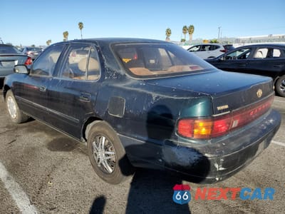 Trzecie zdjęcie samochodu z tyłu: 1994 TOYOTA CAMRY LE VIN:JT2SK12E1R0243825 - miniatura