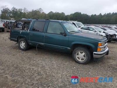 Czwarte zdjęcie samochodu z boku: 1998 CHEVROLET SUBURBAN C1500 VIN:3GNEC16R3WG133520 - miniatura