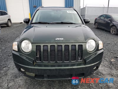 Piąte zdjęcie samochodu w środku: 2010 JEEP COMPASS SPORT VIN:1J4NT4FA2AD654961 - miniatura