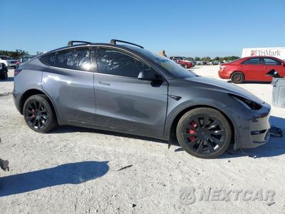 Czwarte zdjęcie samochodu z boku: 2022 TESLA MODEL Y VIN:7SAYGDEEXNF368353 - miniatura