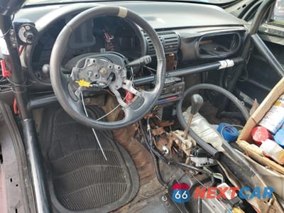 Zdjęcie 8 z 12 samochodu: 1999 SATURN SC2 VIN:1G8ZR1270XZ271458 - miniatura