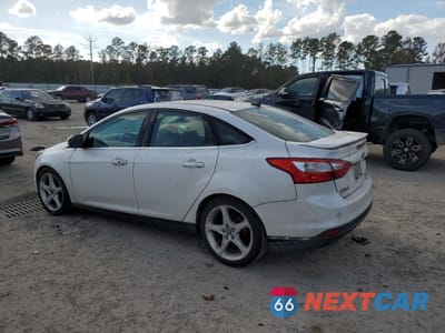 Drugie zdjęcie samochodu z przodu: 2013 FORD FOCUS TITANIUM VIN:1FADP3J25DL259382 - miniatura