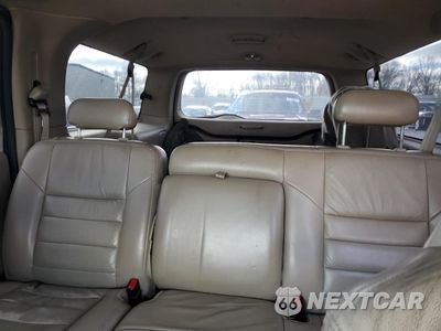 Zdjęcie 10 z 15 samochodu: 2004 FORD EXCURSION LIMITED VIN:1FMSU43P74EB12117 - miniatura