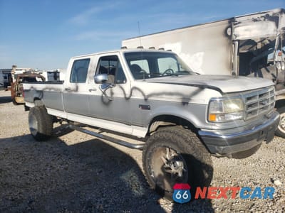 Czwarte zdjęcie samochodu z boku: 1994 FORD F350 VIN:1FTJW35K0REA05715 - miniatura