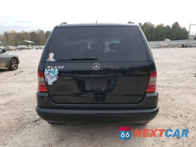 Zdjęcie 6 z 13 samochodu: 1999 MERCEDES-BENZ ML 430 VIN:4JGAB72E2XA060295 - miniatura