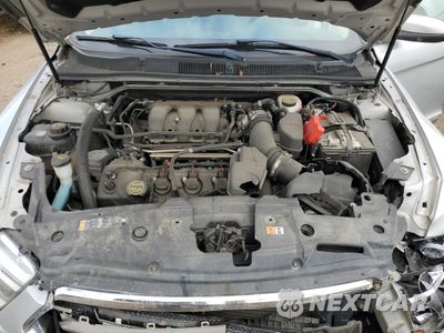 Zdjęcie 12 z 14 samochodu: 2016 FORD TAURUS SEL VIN:1FAHP2H86GG119229 - miniatura