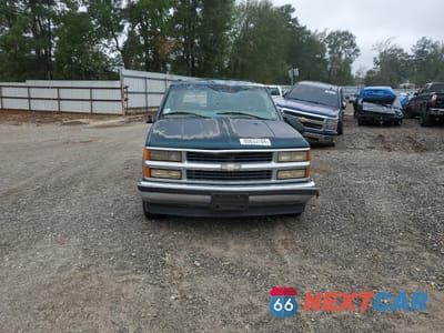 Piąte zdjęcie samochodu w środku: 1998 CHEVROLET SUBURBAN C1500 VIN:3GNEC16R3WG133520 - miniatura