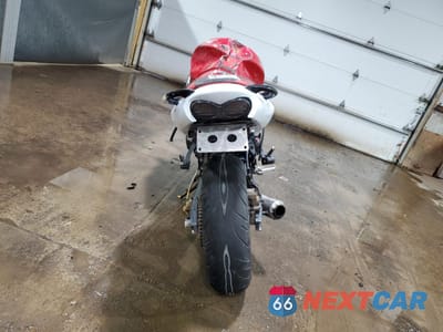 Czwarte zdjęcie samochodu z boku: 2000 KAWASAKI ZX600 J1 VIN:JKAZX4J1XYA017759 - miniatura