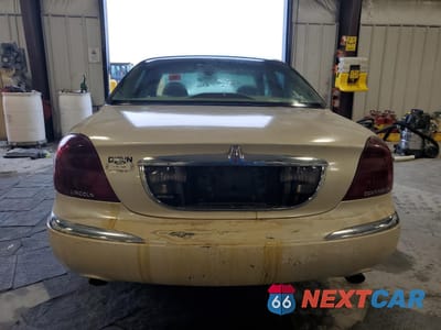 Zdjęcie 6 z 12 samochodu: 2002 LINCOLN CONTINENTAL VIN:1LNHM97V72Y659531 - miniatura