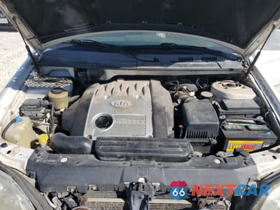 Zdjęcie 12 z 13 samochodu: 2004 KIA SEDONA EX VIN:KNDUP131946548637 - miniatura