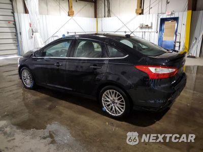Drugie zdjęcie samochodu z przodu: 2014 FORD FOCUS TITANIUM VIN:1FADP3J24EL165026 - miniatura