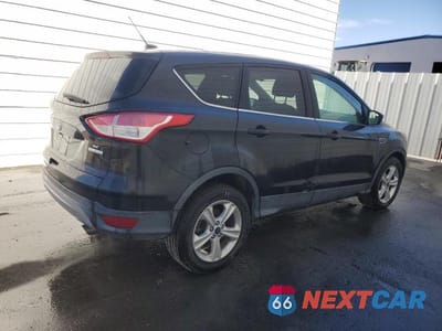 Trzecie zdjęcie samochodu z tyłu: 2014 FORD ESCAPE SE VIN:1FMCU0GX9EUC46058 - miniatura