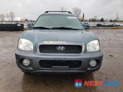 Piąte zdjęcie samochodu w środku: 2001 HYUNDAI SANTA FE GLS VIN:KM8SC83D11U103866 - miniatura