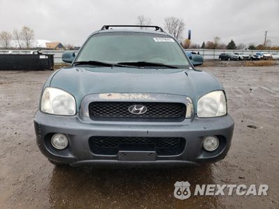 Piąte zdjęcie samochodu w środku: 2001 HYUNDAI SANTA FE GLS VIN:KM8SC83D11U103866 - miniatura