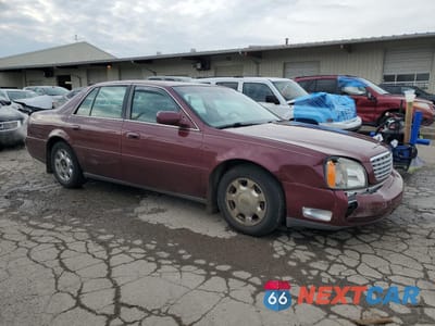 Czwarte zdjęcie samochodu z boku: 2002 CADILLAC DEVILLE VIN:1G6KD57Y72U259850 - miniatura