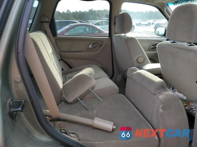 Zdjęcie 21 z 26 samochodu: 2002 MAZDA TRIBUTE LX VIN:4F2YU08132KM22470 - miniatura