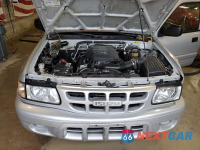 Zdjęcie 13 z 14 samochodu: 2000 ISUZU RODEO S VIN:4S2DM58WXY4346884 - miniatura