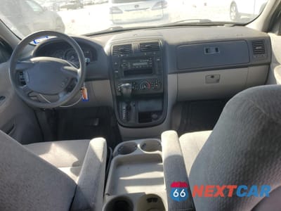 Zdjęcie 8 z 13 samochodu: 2004 KIA SEDONA EX VIN:KNDUP131946548637 - miniatura