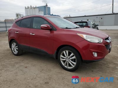 Czwarte zdjęcie samochodu z boku: 2011 HYUNDAI TUCSON GLS VIN:KM8JU3AC6BU209866 - miniatura