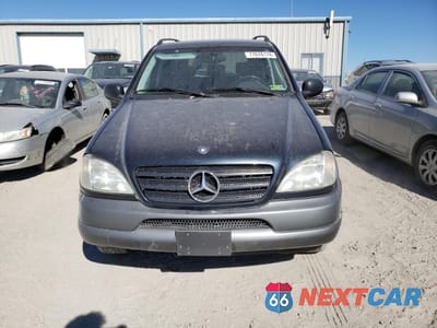 Piąte zdjęcie samochodu w środku: 1999 MERCEDES-BENZ ML 320 VIN:4JGAB54E1XA143959 - miniatura