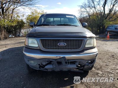 Piąte zdjęcie samochodu w środku: 2002 FORD F150 VIN:1FTRX18L52NB14914 - miniatura