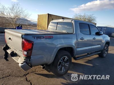 Trzecie zdjęcie samochodu z tyłu: 2019 TOYOTA TACOMA DOUBLE CAB VIN:3TMCZ5AN4KM284811 - miniatura