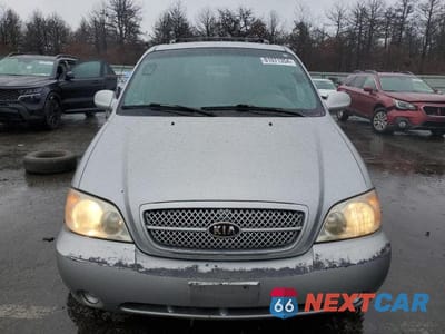 Piąte zdjęcie samochodu w środku: 2005 KIA SEDONA EX VIN:KNDUP132X56664939 - miniatura