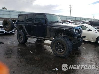 Czwarte zdjęcie samochodu z boku: 2014 JEEP WRANGLER UNLIMITED SPORT VIN:1C4BJWDG1EL145442 - miniatura