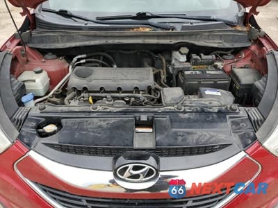 Zdjęcie 12 z 13 samochodu: 2011 HYUNDAI TUCSON GLS VIN:KM8JU3AC6BU209866 - miniatura