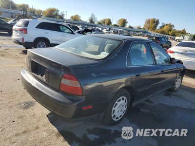 Trzecie zdjęcie samochodu z tyłu: 1994 HONDA ACCORD LX VIN:1HGCD5638RA000515 - miniatura